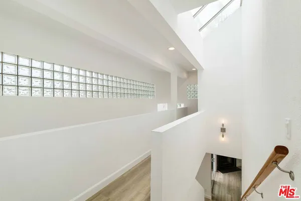a view of livingroom and hardwood floor