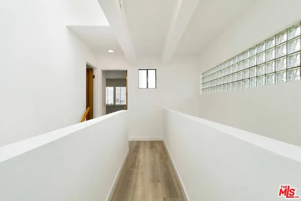 a view of a hallway with entryway