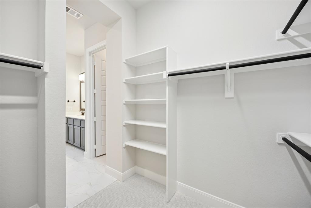 1837 Lightner Road Van Alstyne, TX 75495 - Photo 16 of 30 a view of walk in closet with empty racks