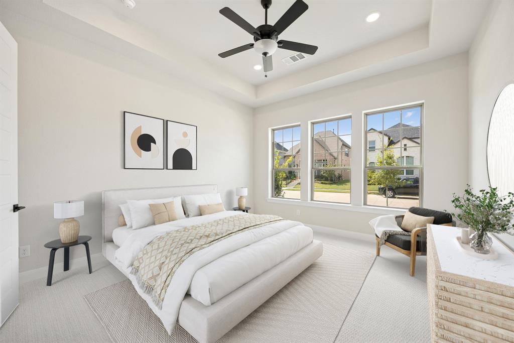 1837 Lightner Road Van Alstyne, TX 75495 - Photo 9 of 30 a bedroom with a large bed and a large window