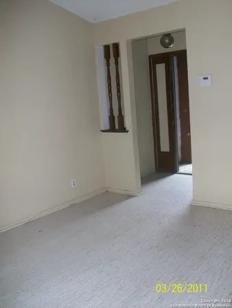 a bathroom with a toilet and a bathtub