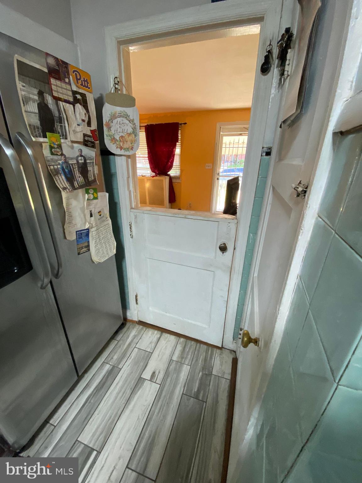 450 Random Road Baltimore, MD 21229 - Photo 5 of 17 a view of an entryway with wooden floor