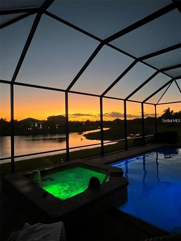 12659 Richezza Drive Venice, FL 34293 - Photo 3 of 42 a view of swimming pool from a balcony