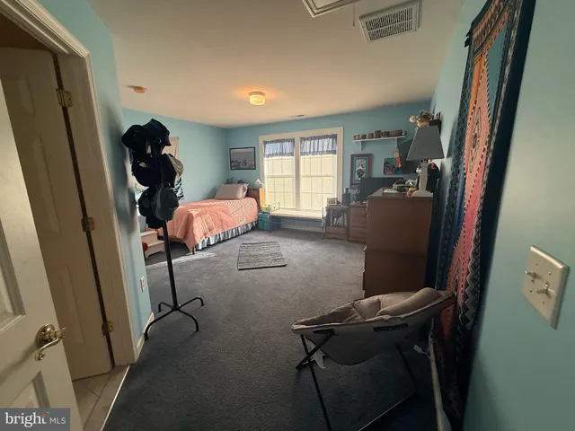 a room with furniture and window