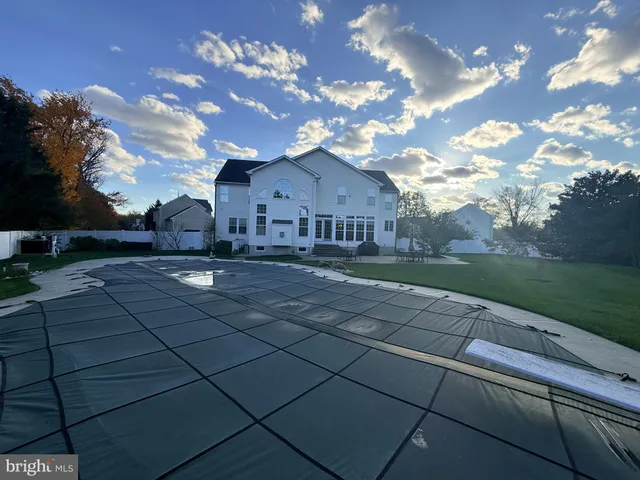 a view of a street with a yard