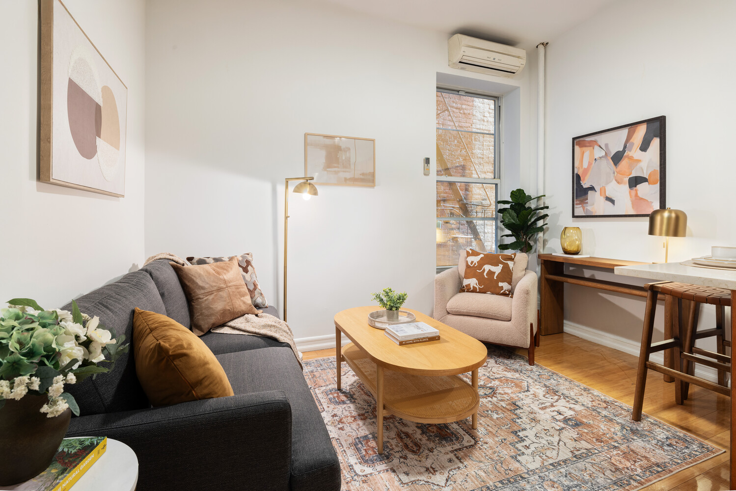 66 West 84th Street, Unit 3F Manhattan, NY 10024 - Photo 3 of 6 a living room with furniture potted plant and bathroom