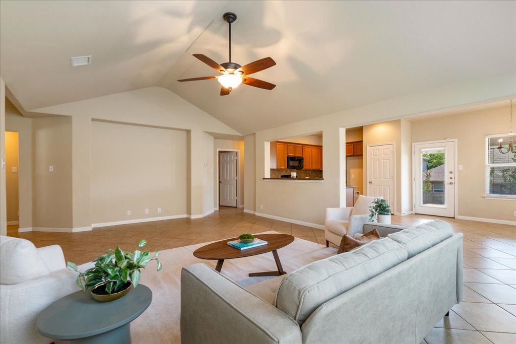 1810 Laminar Creek Road Cedar Park, TX 78613 - Photo 8 of 25 a living room with furniture and a potted plant