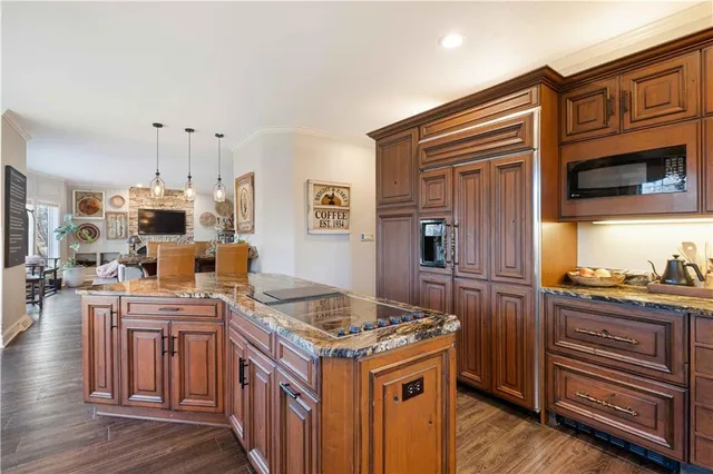 a living room with fireplace furniture and a flat screen tv