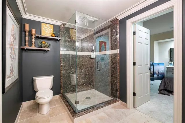 a kitchen with stainless steel appliances white cabinets and a sink