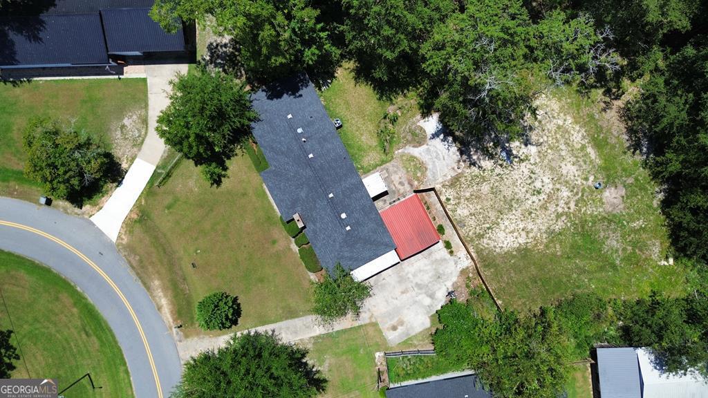 108 Plum Street Dublin, GA 31021 - Photo 8 of 33 an aerial view of a house with a yard