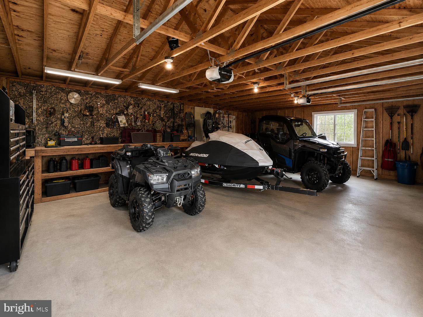 303 Flickerwood Road Kane, PA 16735 - Photo 25 of 25 a car parked in garage