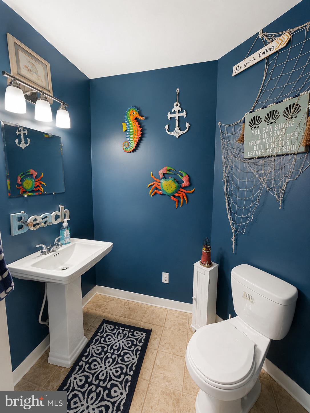 303 Flickerwood Road Kane, PA 16735 - Photo 9 of 25 a bathroom with a toilet a sink and vanity
