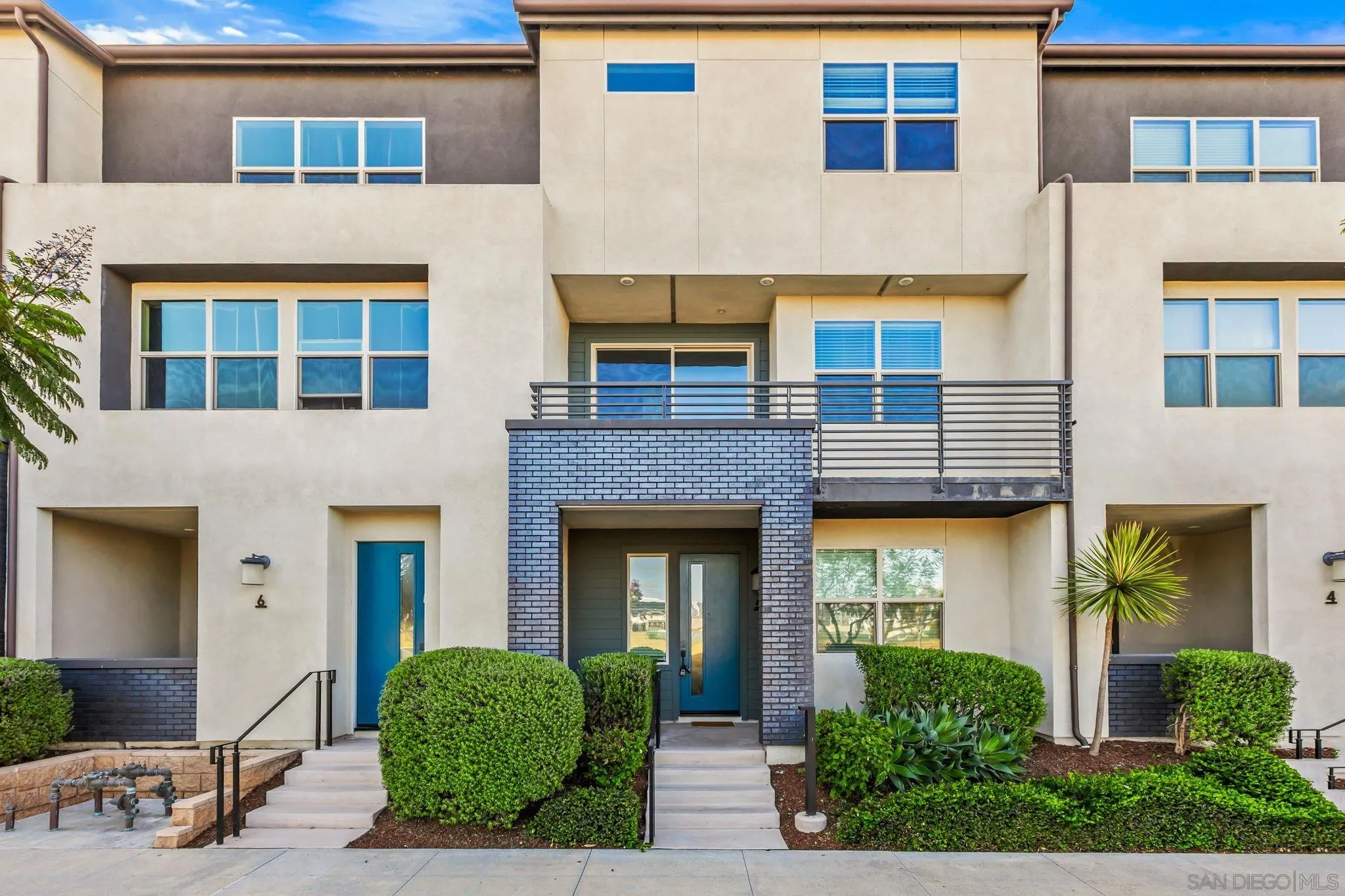 1922 Strata Street, Unit 5 Chula Vista, CA 91915 - Photo 1 of 45 a front view of a house having yard