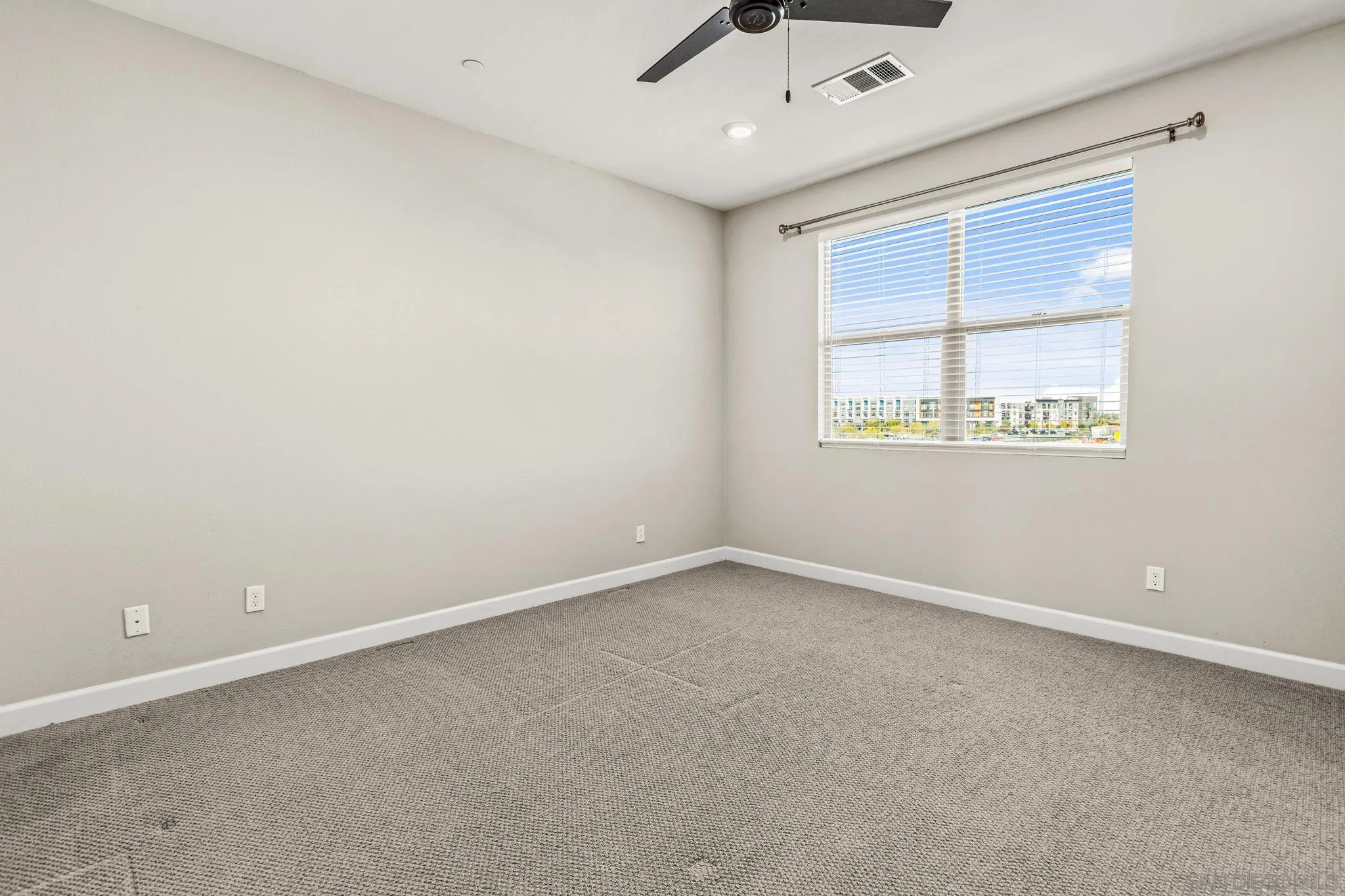 1922 Strata Street, Unit 5 Chula Vista, CA 91915 - Photo 15 of 45 an empty room with a window