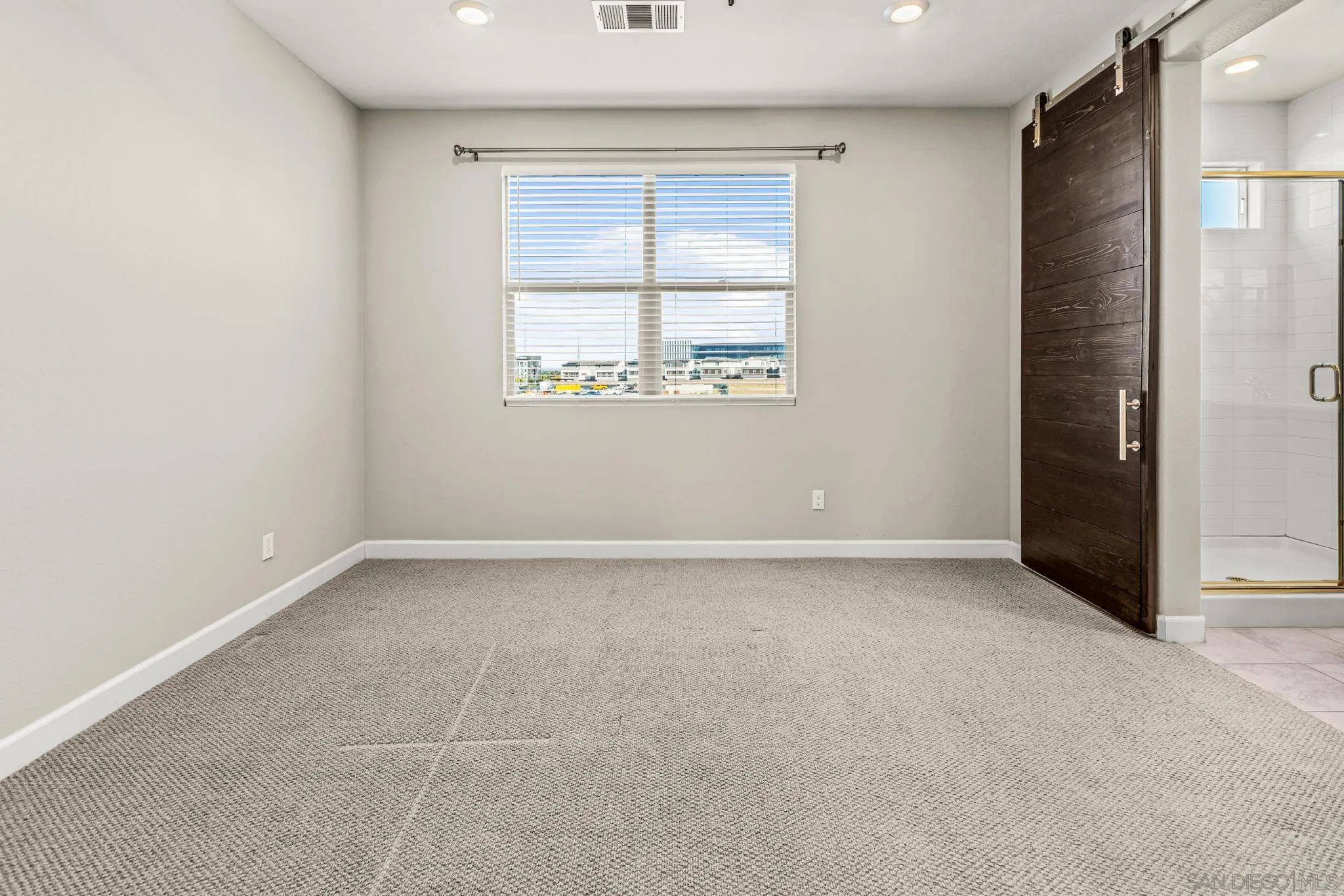 1922 Strata Street, Unit 5 Chula Vista, CA 91915 - Photo 16 of 45 an empty room with a window