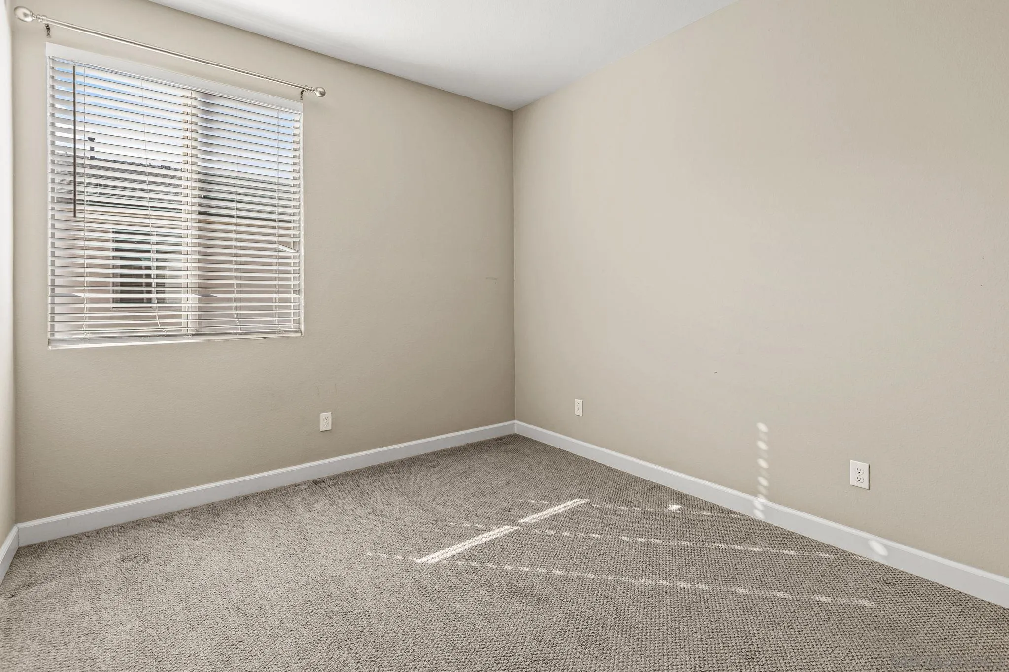 1922 Strata Street, Unit 5 Chula Vista, CA 91915 - Photo 18 of 45 an empty room with a window