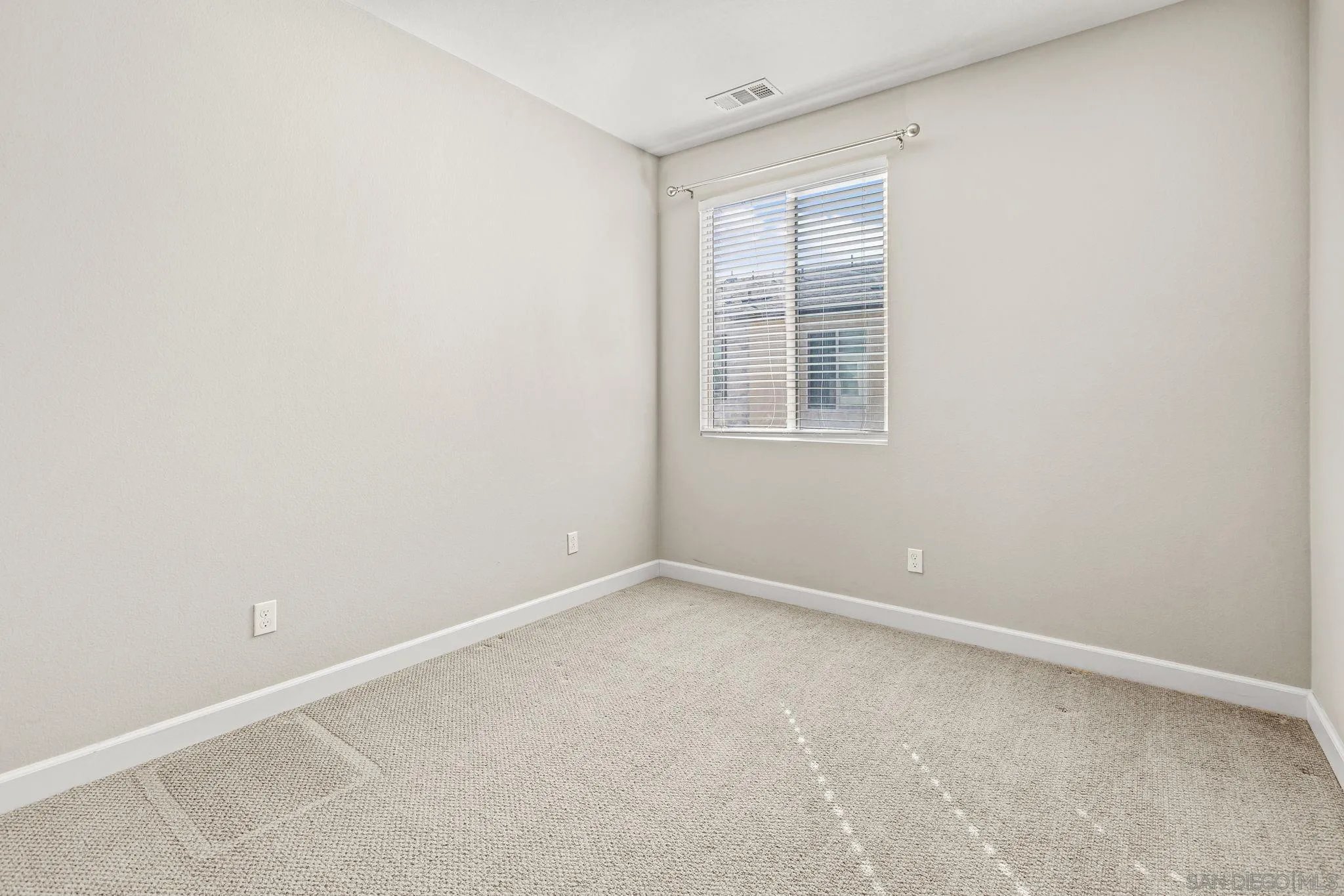 1922 Strata Street, Unit 5 Chula Vista, CA 91915 - Photo 19 of 45 an empty room with a window