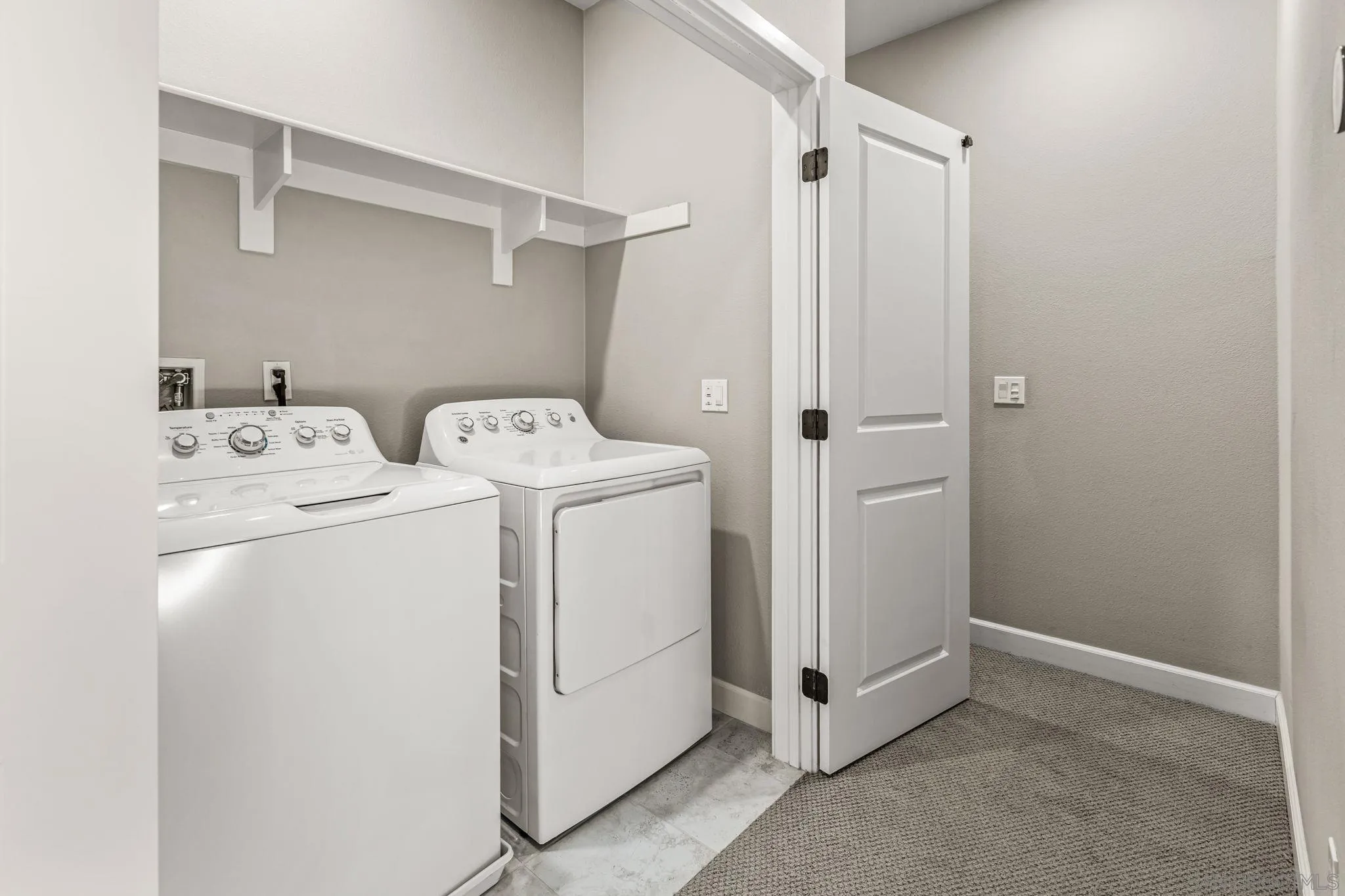 1922 Strata Street, Unit 5 Chula Vista, CA 91915 - Photo 21 of 45 a utility room with dryer and washer