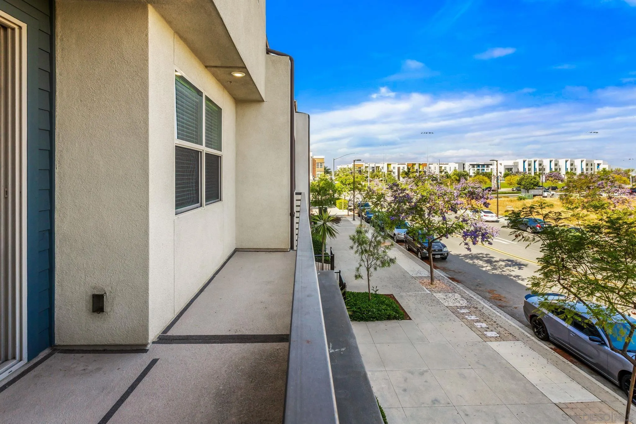 1922 Strata Street, Unit 5 Chula Vista, CA 91915 - Photo 26 of 45 a view of a balcony with wooden floor