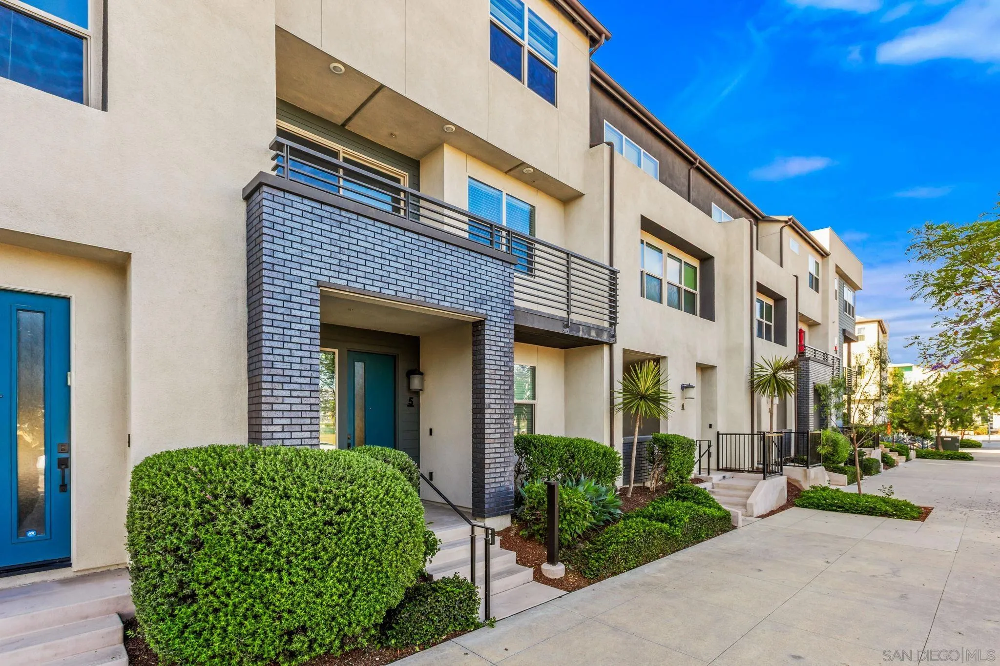 1922 Strata Street, Unit 5 Chula Vista, CA 91915 - Photo 29 of 45 a view of a building with a garden