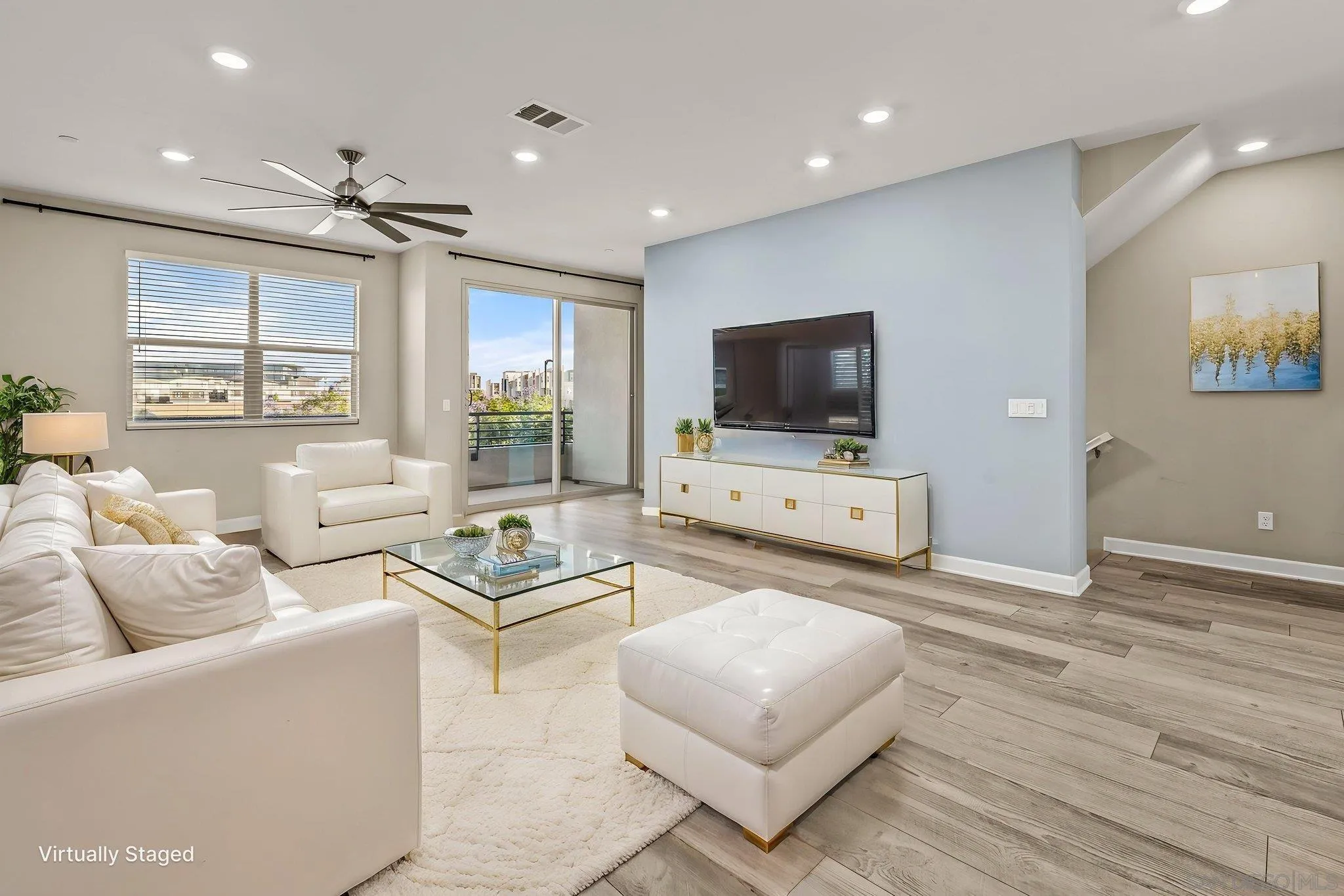 1922 Strata Street, Unit 5 Chula Vista, CA 91915 - Photo 3 of 45 a living room with furniture and a flat screen tv