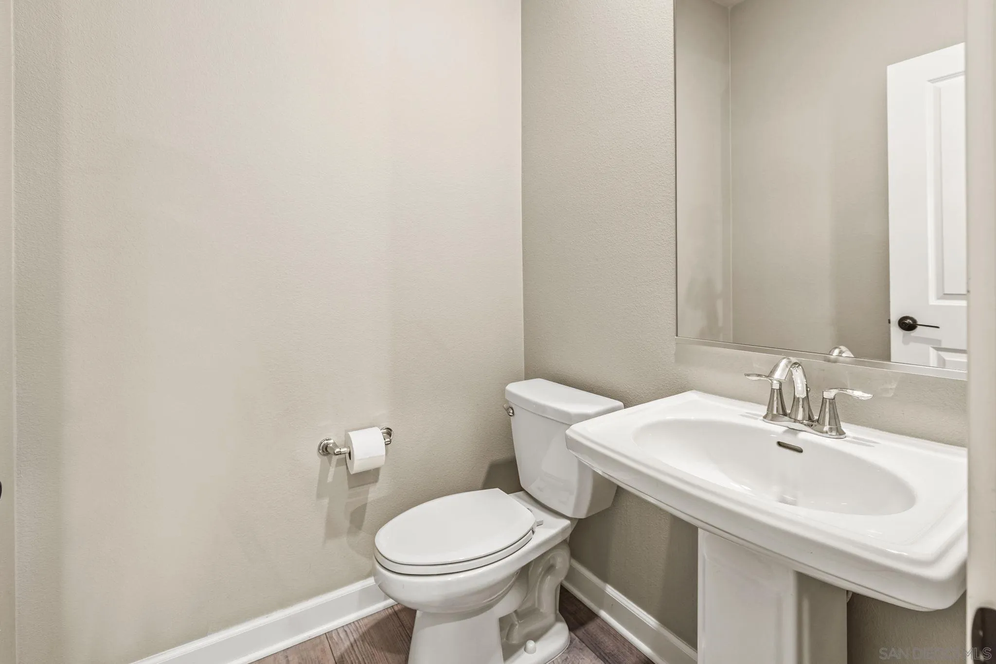 1922 Strata Street, Unit 5 Chula Vista, CA 91915 - Photo 10 of 45 a bathroom with a sink and a toilet