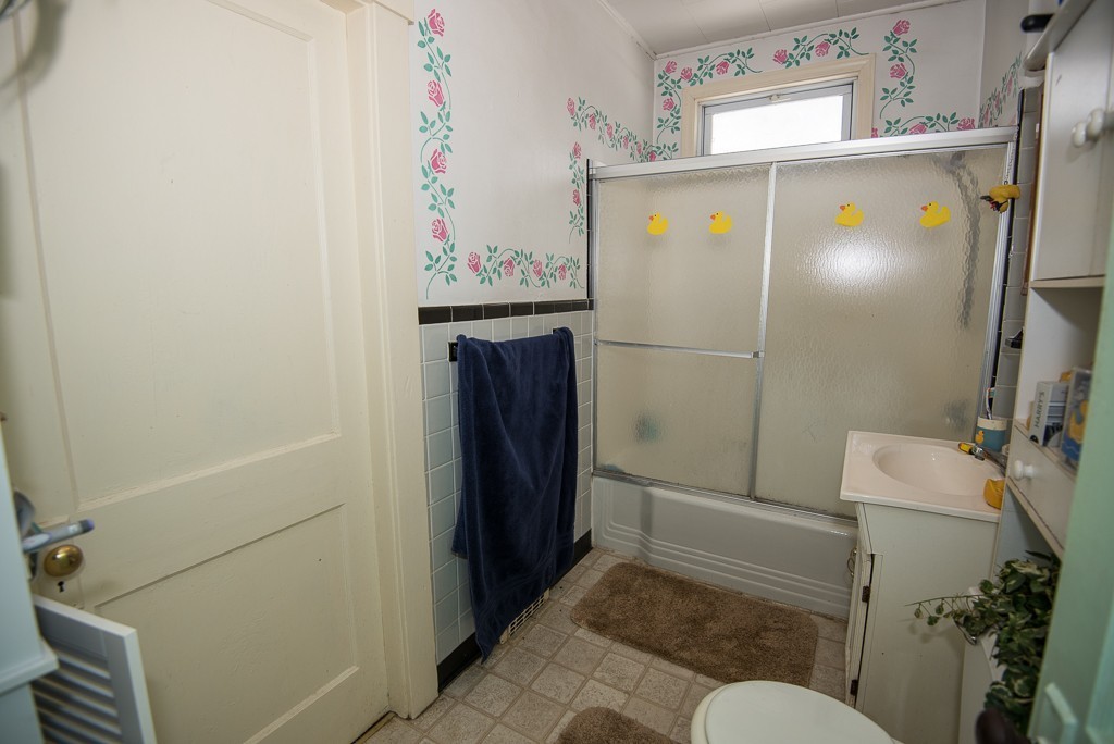 7-9 Boynton Street Clinton, MA 01510 - Photo 11 of 28 a bathroom with a sink toilet and shower