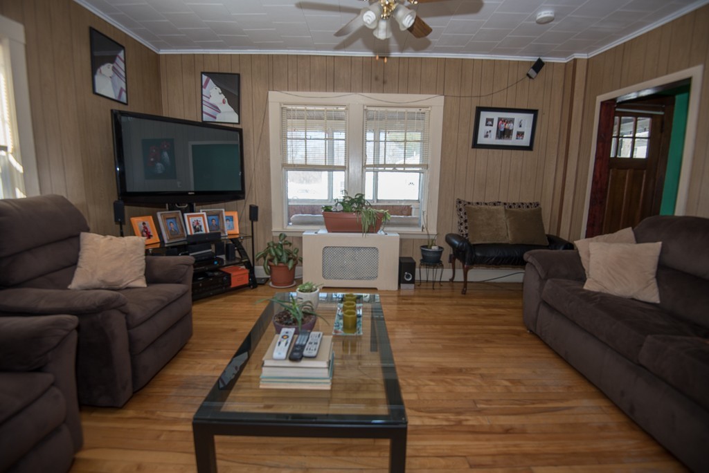 7-9 Boynton Street Clinton, MA 01510 - Photo 15 of 28 a living room with furniture and a flat screen tv
