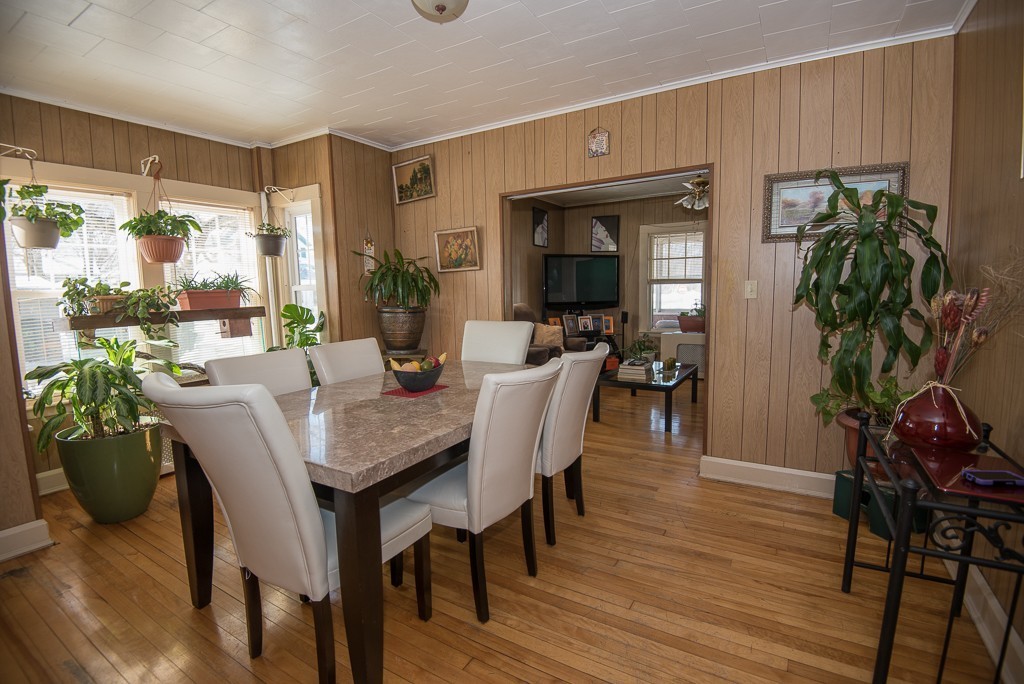 7-9 Boynton Street Clinton, MA 01510 - Photo 19 of 28 a view of a dining room with furniture window and wooden floor