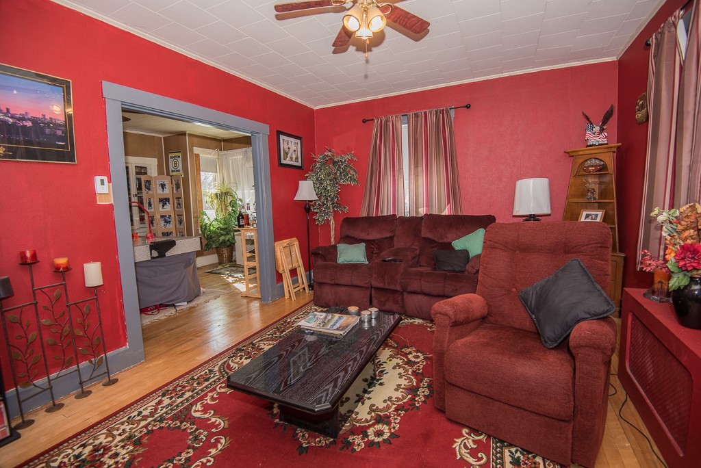 7-9 Boynton Street Clinton, MA 01510 - Photo 2 of 28 a living room with furniture and a rug