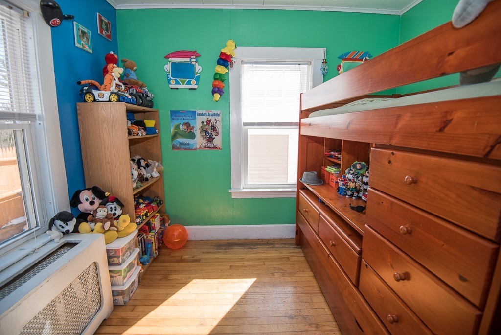 7-9 Boynton Street Clinton, MA 01510 - Photo 22 of 28 a room with toys and a large window