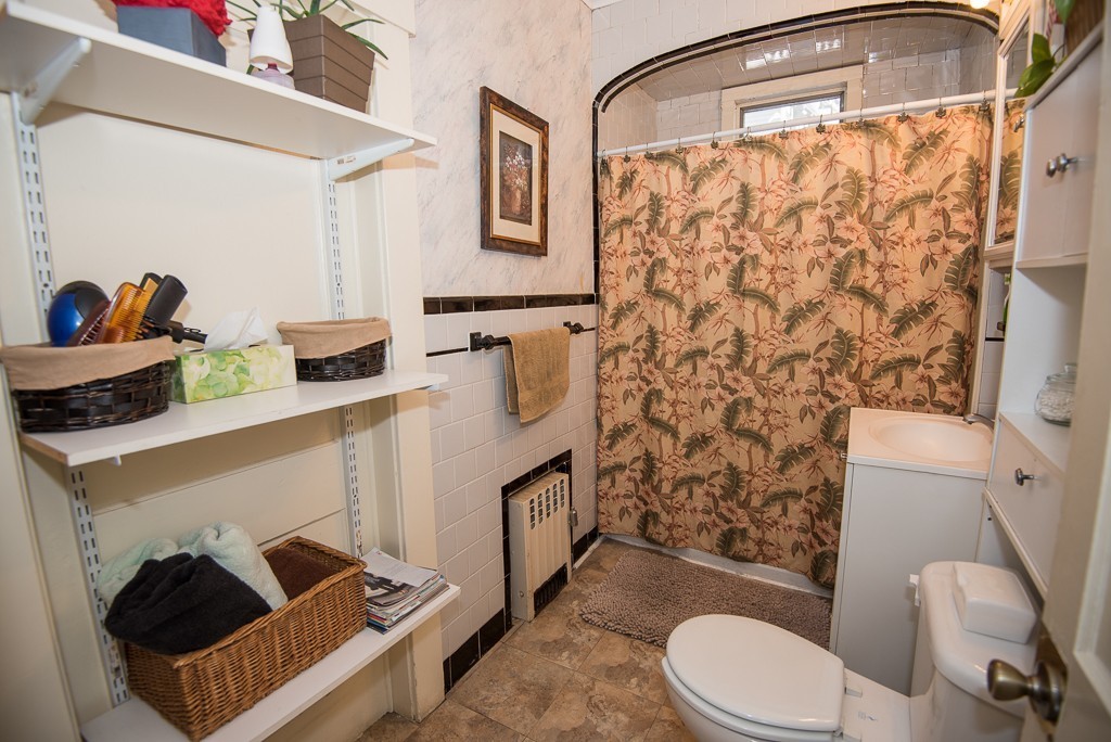 7-9 Boynton Street Clinton, MA 01510 - Photo 23 of 28 a bathroom with a sink toilet and shower
