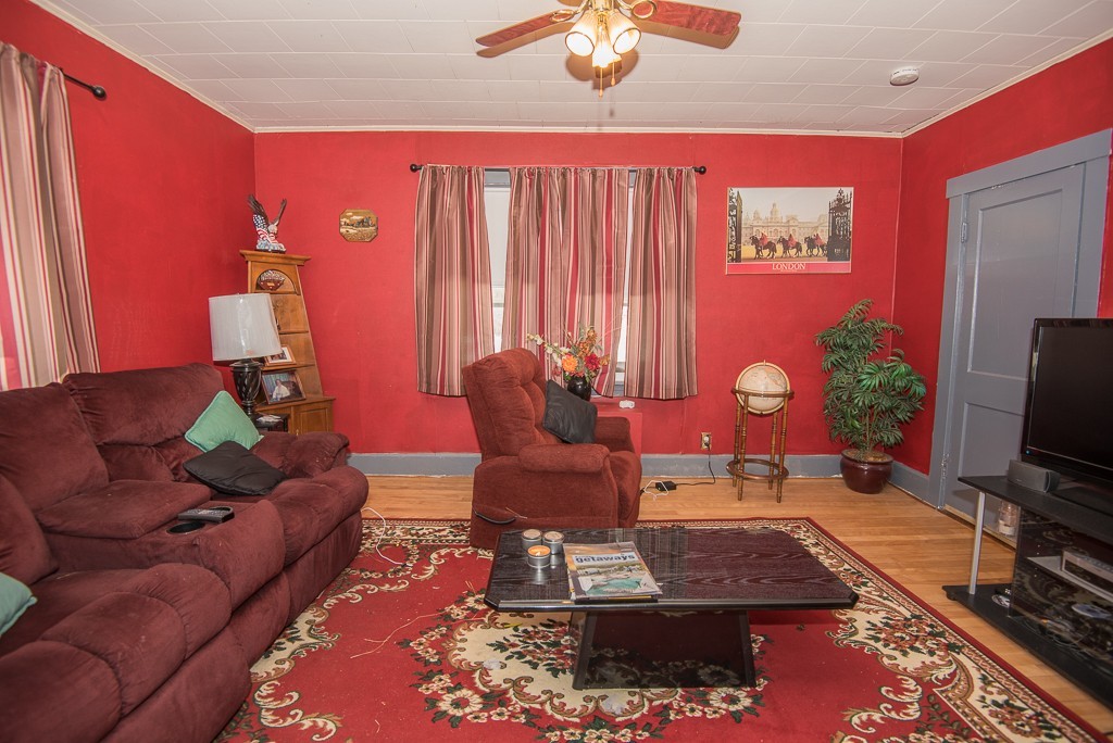7-9 Boynton Street Clinton, MA 01510 - Photo 3 of 28 a living room with furniture and wooden floor