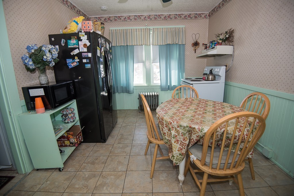 7-9 Boynton Street Clinton, MA 01510 - Photo 6 of 28 a dining room with furniture and window