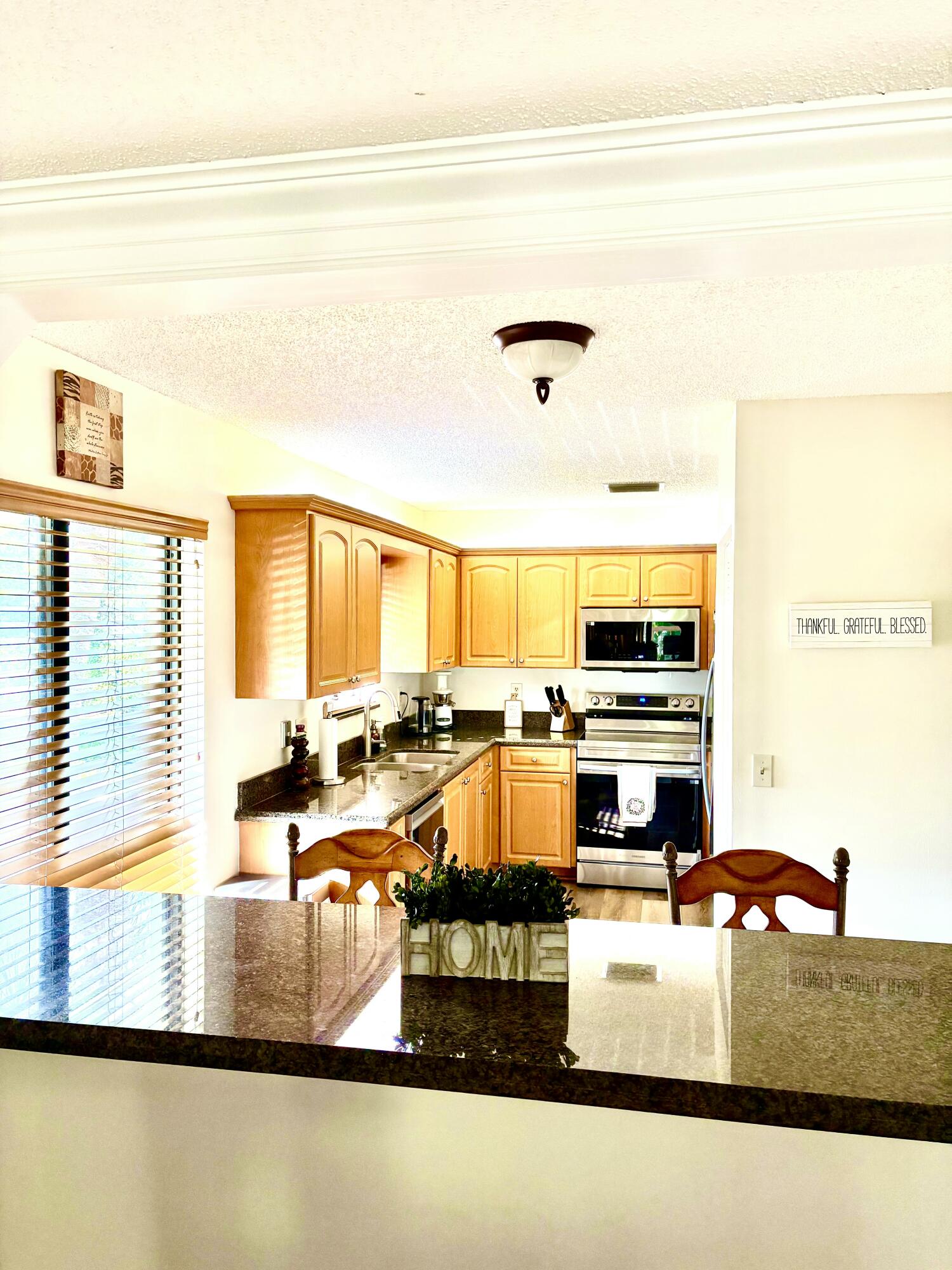 159 Northwest 70th Street, Unit 518 Boca Raton, FL 33487 - Photo 1 of 15 Kitchen w/new S/S appliances