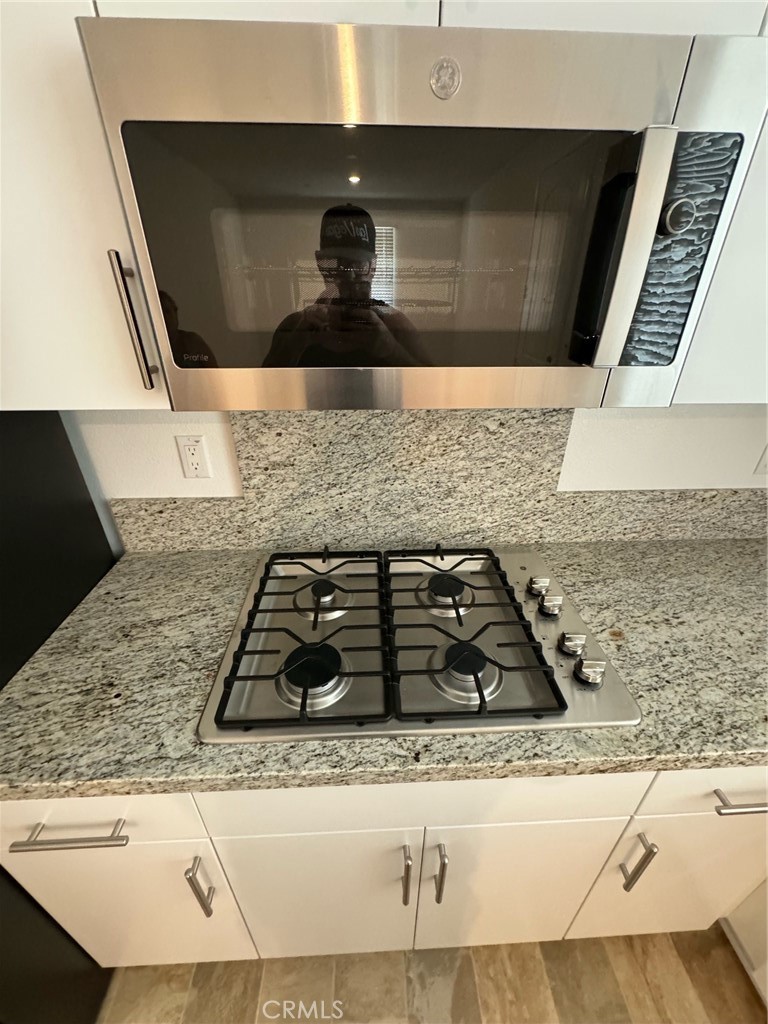 25685 Branson Lane Homeland, CA 92548 - Photo 5 of 13 a close view of a stove