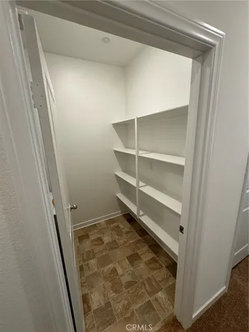 a room with storage and utility