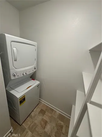 a bathroom with a sink toilet and mirror