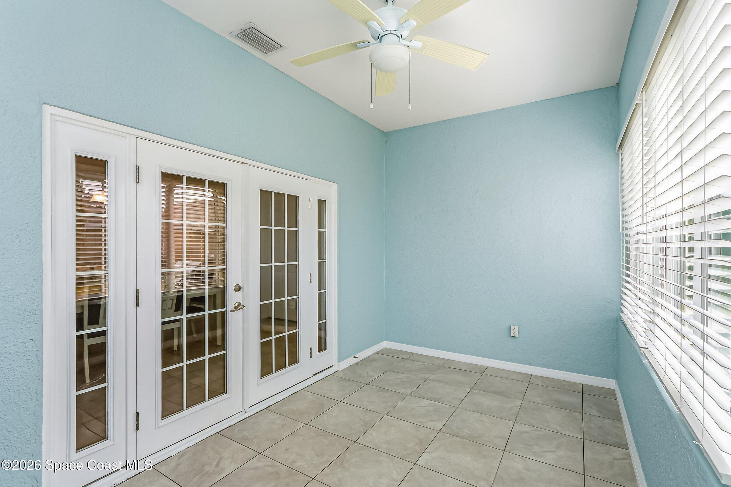 1069 South Fork Circle Melbourne, FL 32901 - Photo 22 of 52 a view of an empty room with a window