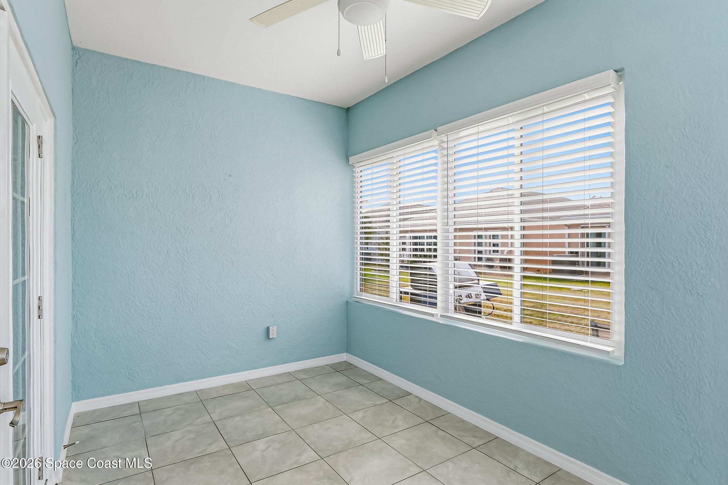 1069 South Fork Circle Melbourne, FL 32901 - Photo 23 of 52 a view of an empty room with a window