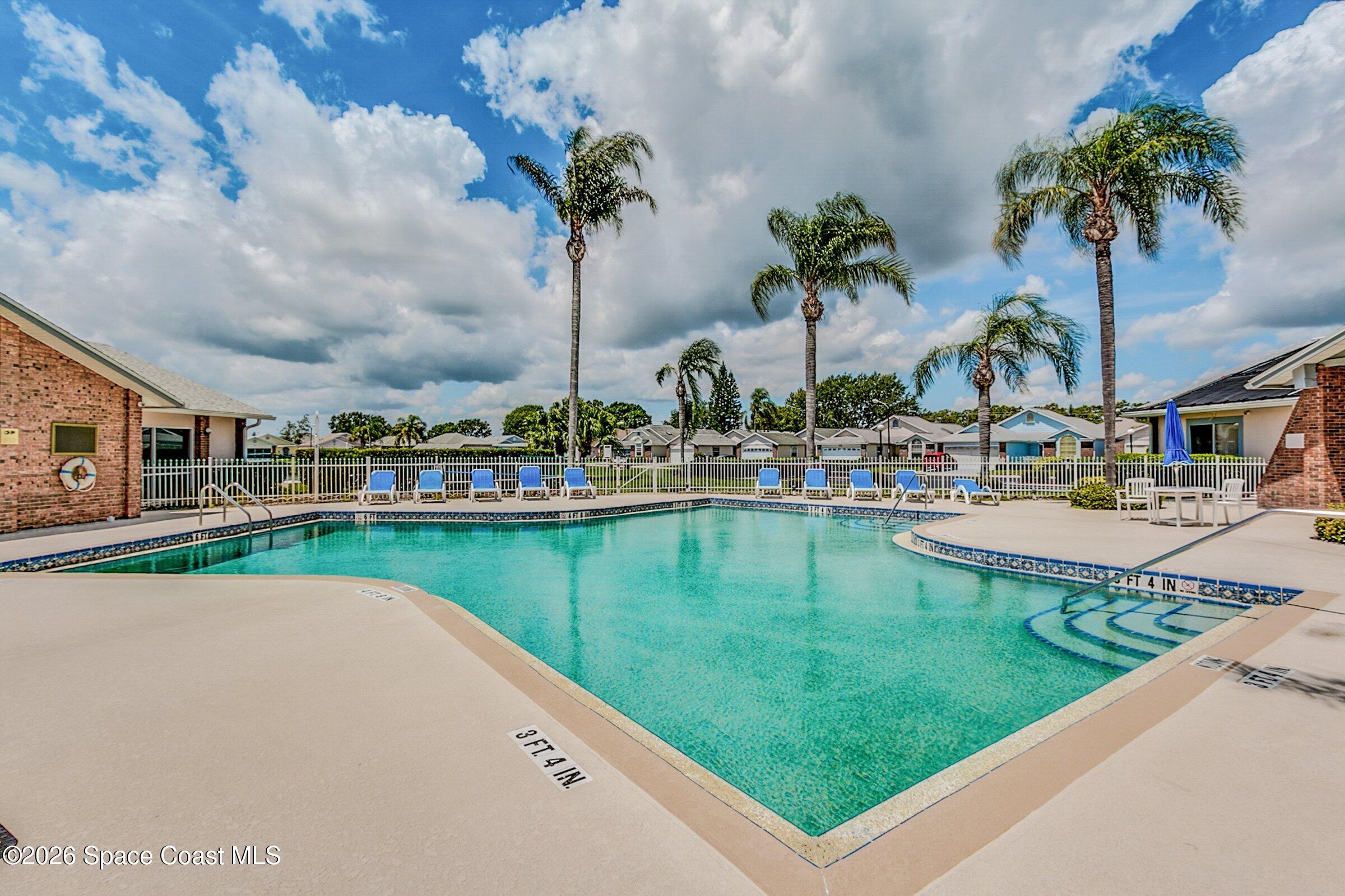 1069 South Fork Circle Melbourne, FL 32901 - Photo 30 of 52 a swimming pool view with a garden space