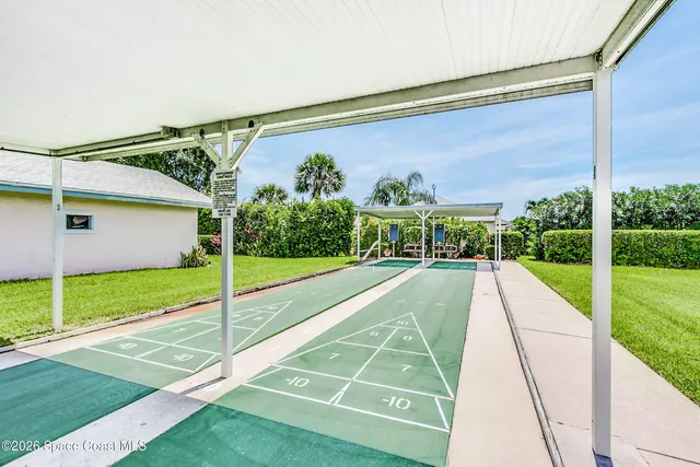 a view of an outdoor space and tennis court