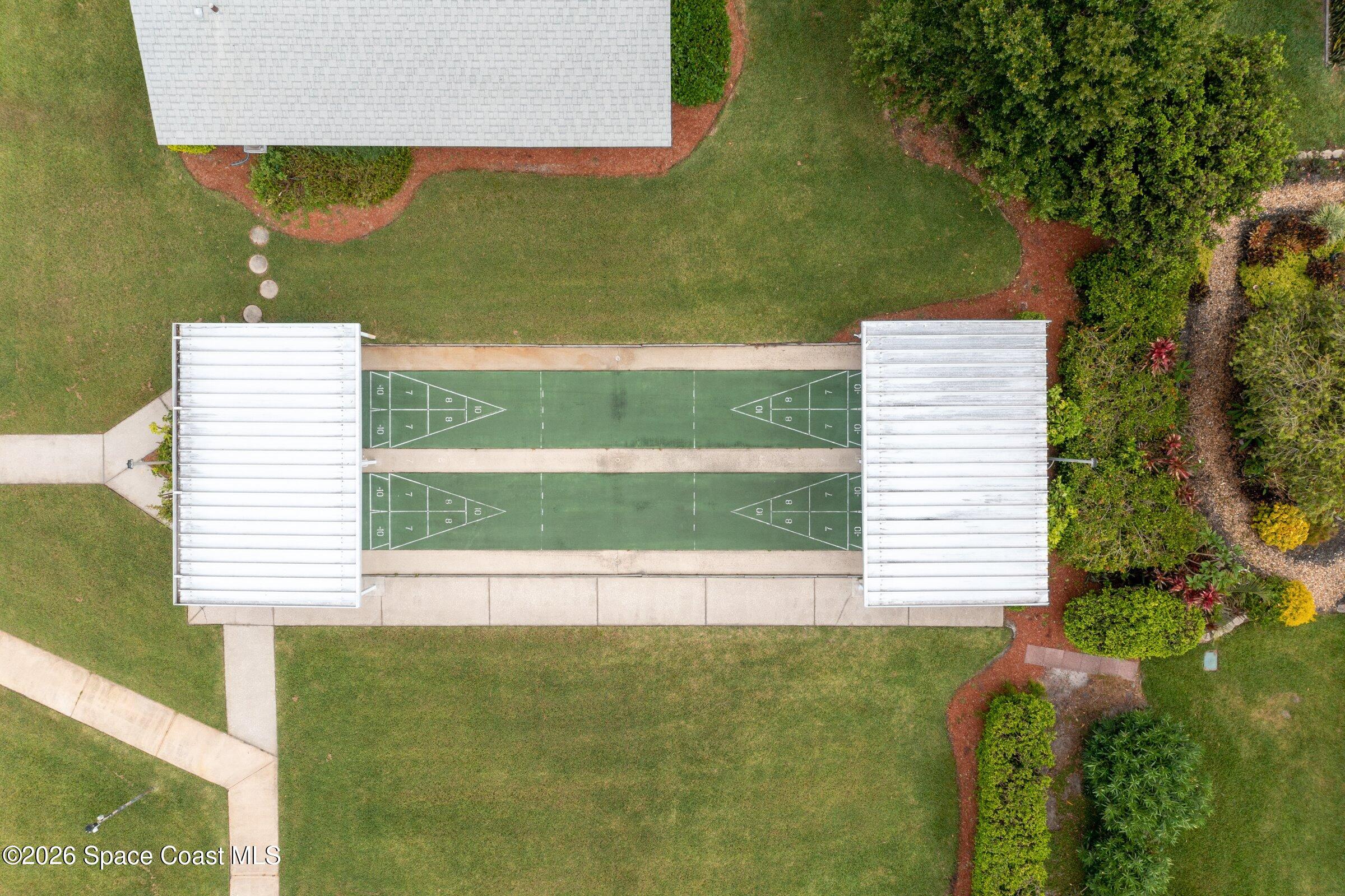 1069 South Fork Circle Melbourne, FL 32901 - Photo 46 of 52 a view of a swimming pool with a yard