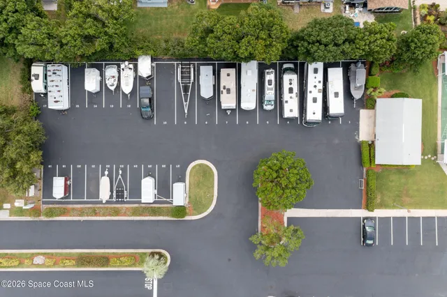 a view of yard with swimming pool and outdoor seating