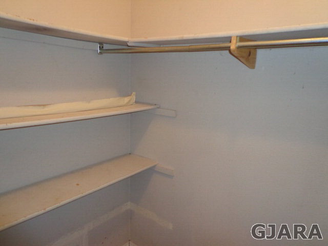 1809 L Road Fruita, CO 81521 - Photo 15 of 19 a view of a room with racks on the wall