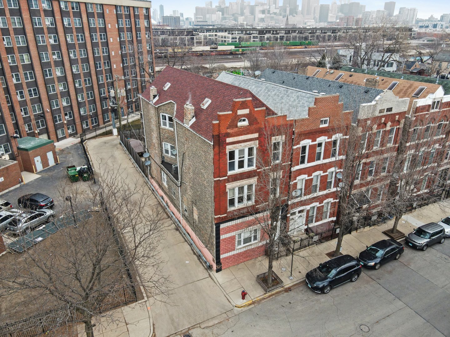 1154 West 17th Street Chicago, IL 60608 - Photo 2 of 35 a city view with tall buildings