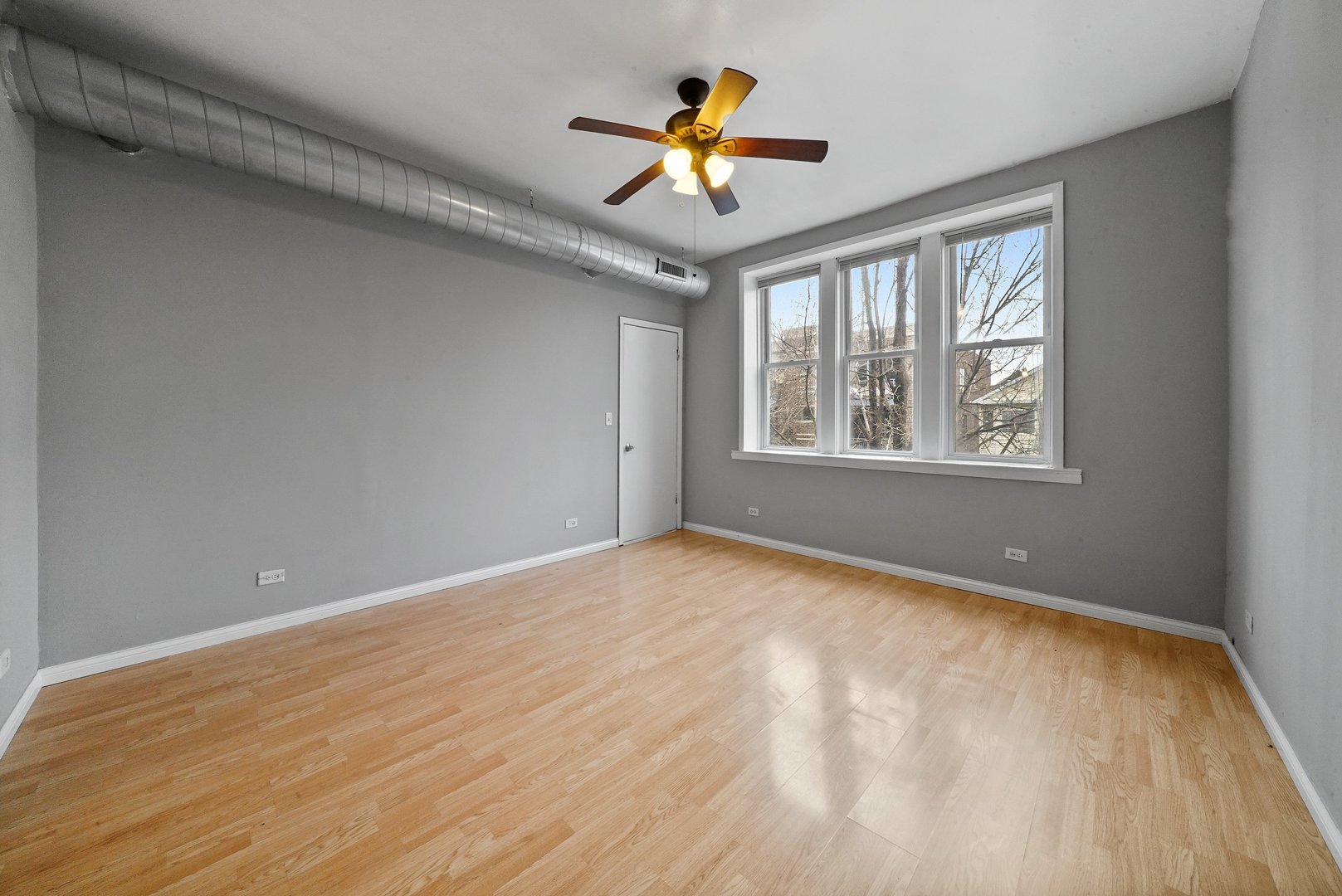 1154 West 17th Street Chicago, IL 60608 - Photo 13 of 35 a view of an empty room with a window