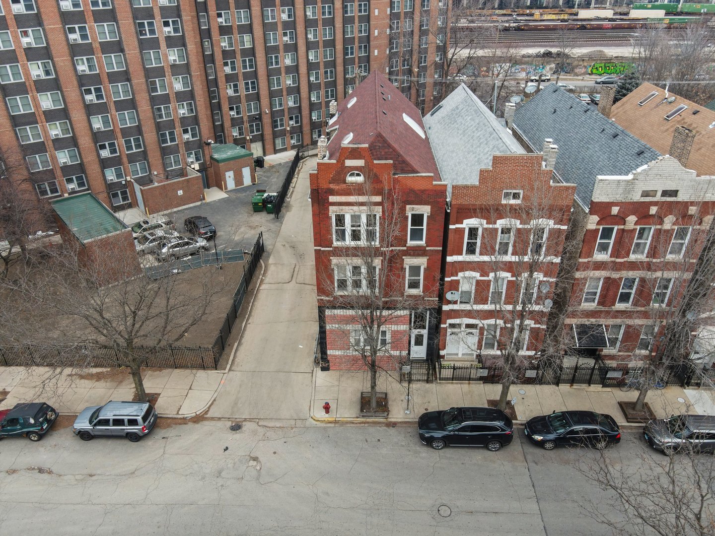 1154 West 17th Street Chicago, IL 60608 - Photo 3 of 35 a view of multiple houses with a yard