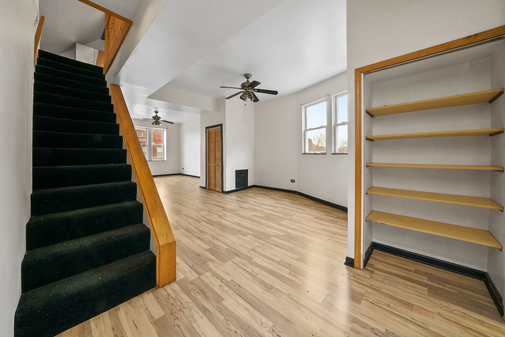 1154 West 17th Street Chicago, IL 60608 - Photo 23 of 35 a view of entryway and hall with wooden floor