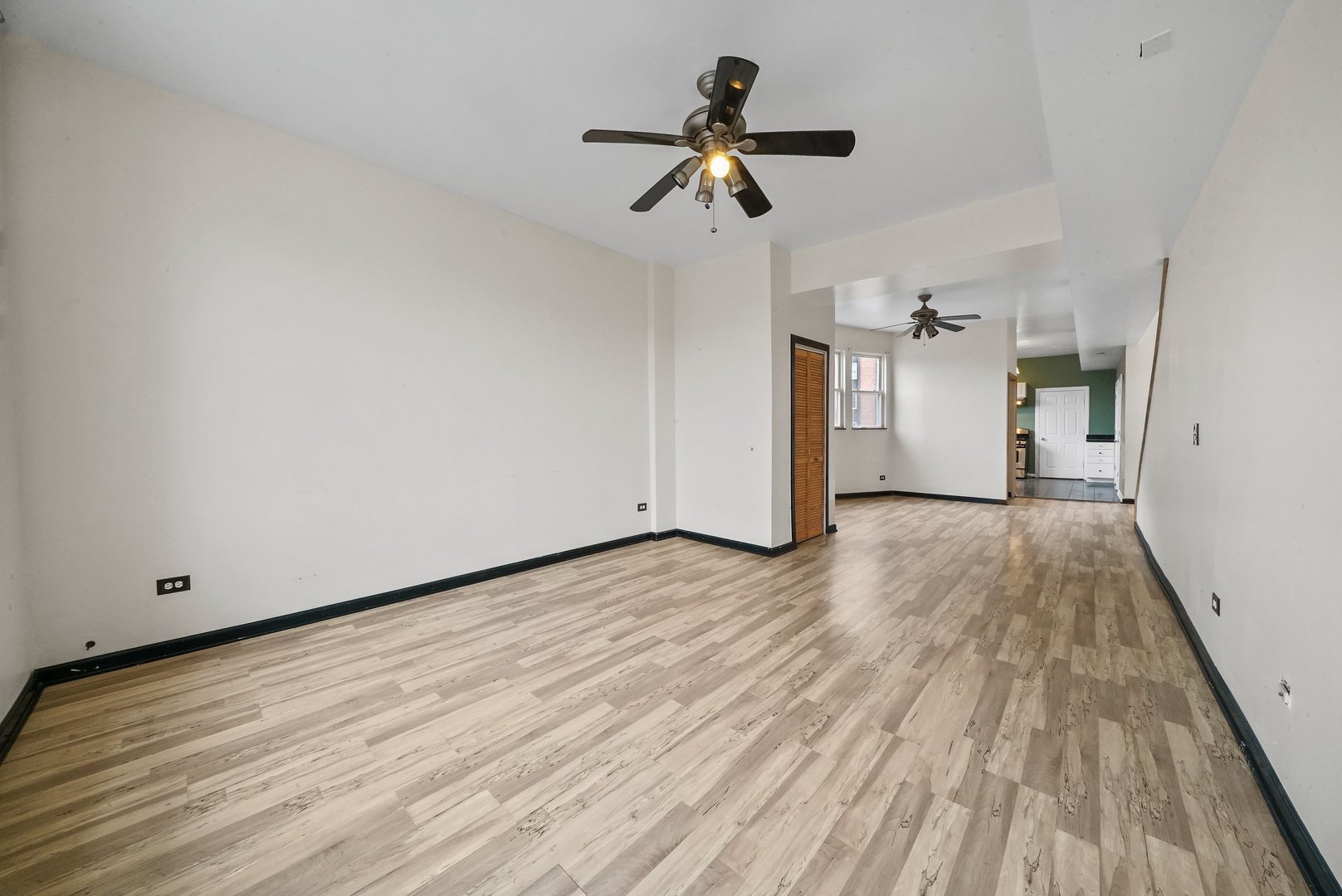 1154 West 17th Street Chicago, IL 60608 - Photo 24 of 35 a view of empty room with wooden floor